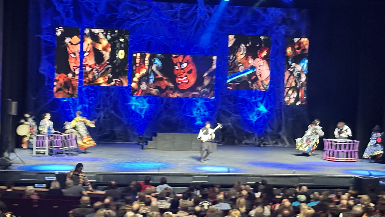 Live theater performance (Japanese kabuki / drumming production) photographed from the audience